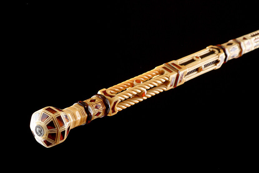 A Superb English Sailors Scrimshaw Carved Walrus Tusk and Whalebone Architectural Walking Cane
